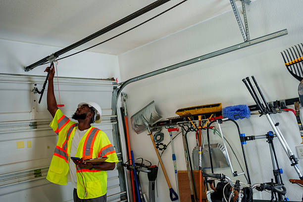 Professional Garage Door Panel Replacement technician working in Edgewood, IN